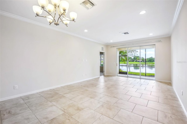 tiled empty room with a water view, ornamental molding, and an inviting chandelier