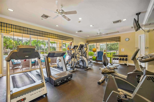 workout area featuring a ceiling fan, baseboards, visible vents, and crown molding