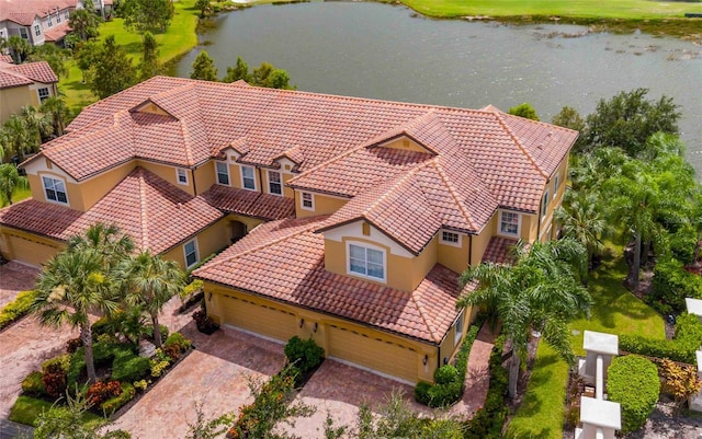 bird's eye view with a water view and a residential view