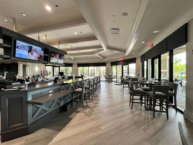 bar with light wood-type flooring