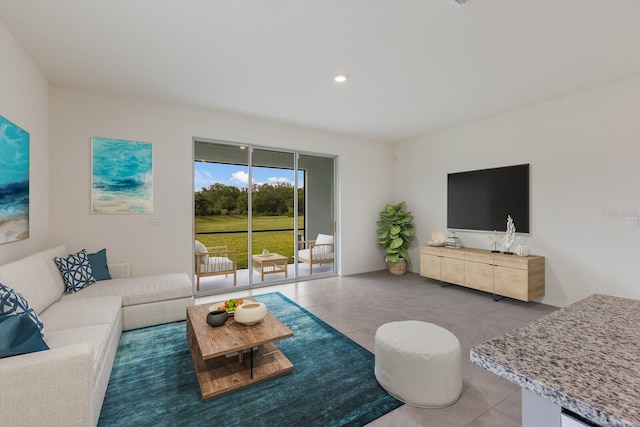 living room with tile patterned flooring