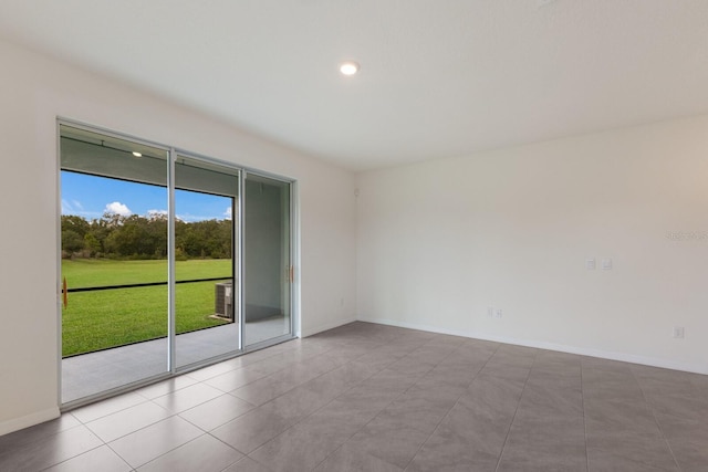 view of tiled spare room