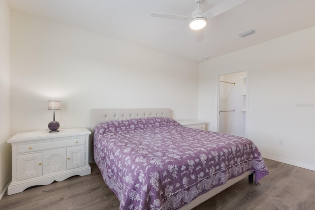 bedroom with ceiling fan and light wood-type flooring