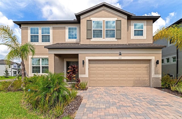 view of front of property featuring a garage