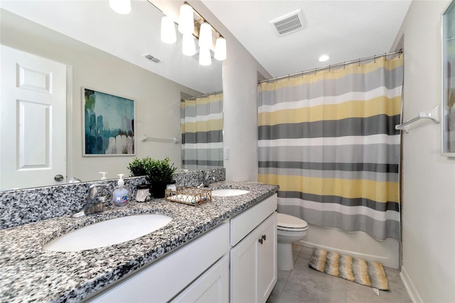 full bathroom with toilet, visible vents, and a sink