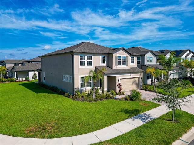 view of front of property featuring stucco siding, a residential view, decorative driveway, and a front lawn