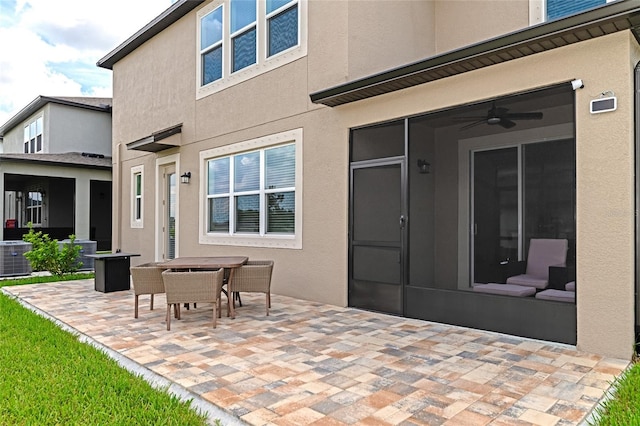 view of patio / terrace featuring central AC, ceiling fan, and outdoor dining space