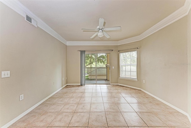 tiled spare room featuring ornamental molding and ceiling fan