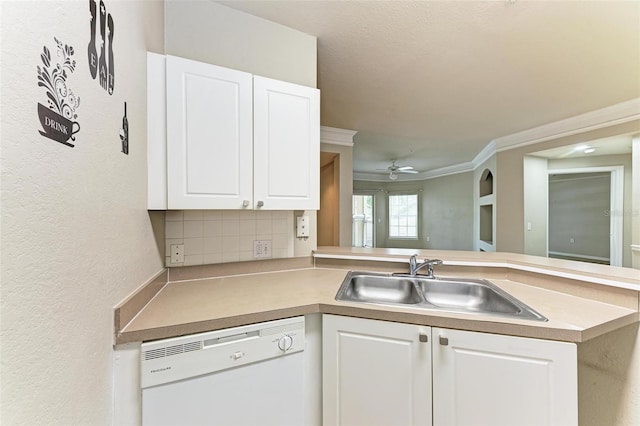 kitchen featuring dishwasher, crown molding, white cabinetry, sink, and ceiling fan