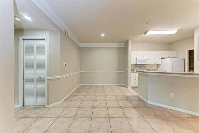 kitchen with white cabinetry, crown molding, white appliances, and light tile patterned floors