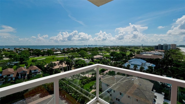 balcony featuring a water view