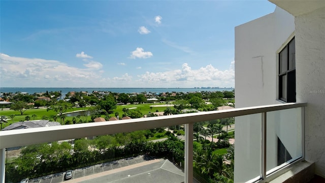 balcony featuring a water view