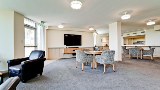 view of carpeted dining space