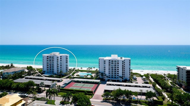 aerial view with a beach view and a water view