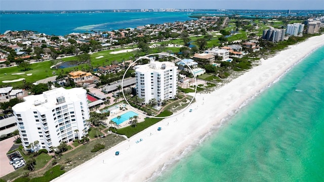 bird's eye view with a view of the beach and a water view