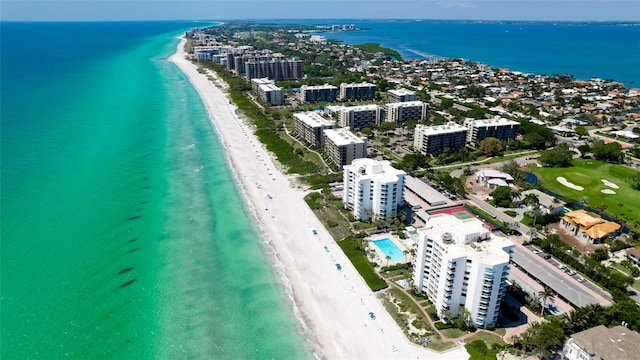 bird's eye view with a view of the beach and a water view