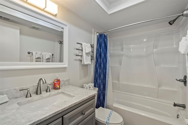 full bathroom with vanity, toilet, ornamental molding, and shower / bath combination with curtain