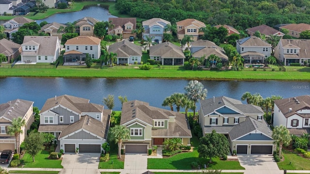 drone / aerial view with a water view