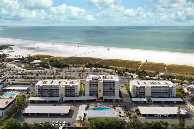 aerial view with a beach view and a water view