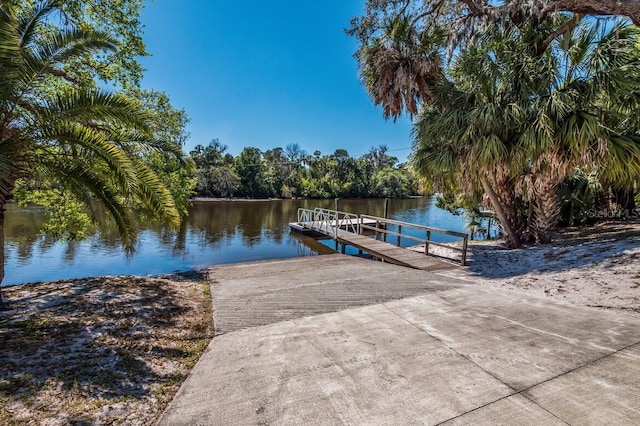 view of dock with a water view