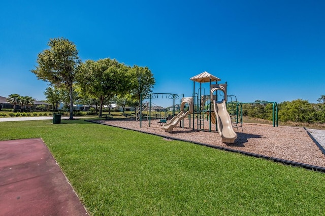 view of jungle gym with a yard