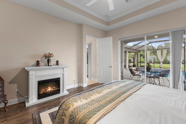 bedroom with ornamental molding, ceiling fan, access to exterior, and dark hardwood / wood-style flooring