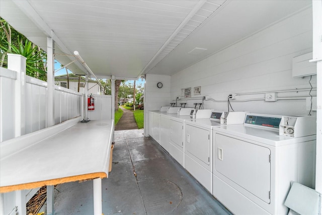 common laundry area with washer and clothes dryer