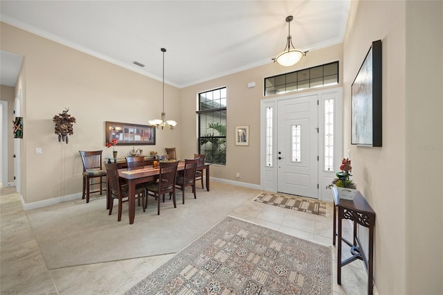 foyer with visible vents, light carpet, crown molding, light tile patterned floors, and baseboards