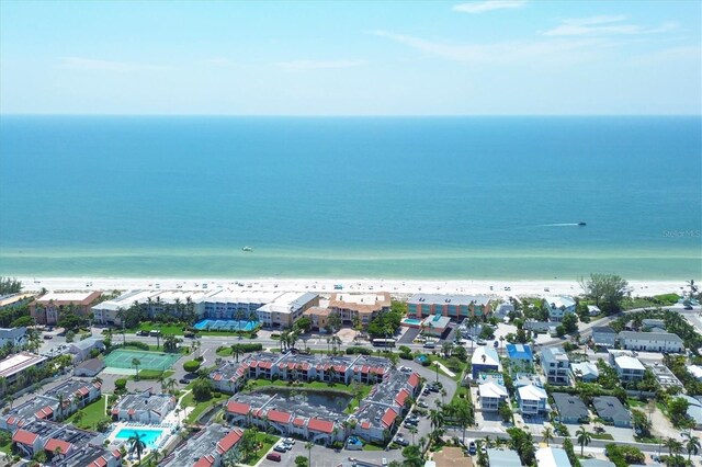 birds eye view of property featuring a water view and a view of the beach