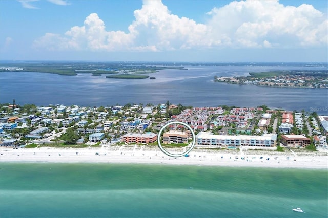 aerial view with a water view and a view of the beach