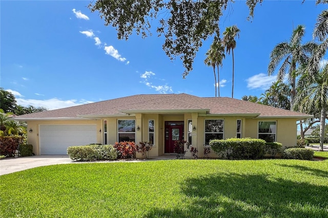 ranch-style house with a front yard and a garage