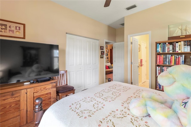 bedroom featuring ceiling fan, a closet, and connected bathroom