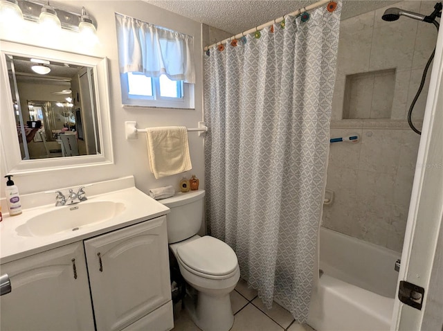 full bathroom featuring toilet, shower / bath combo with shower curtain, a textured ceiling, vanity, and tile patterned flooring