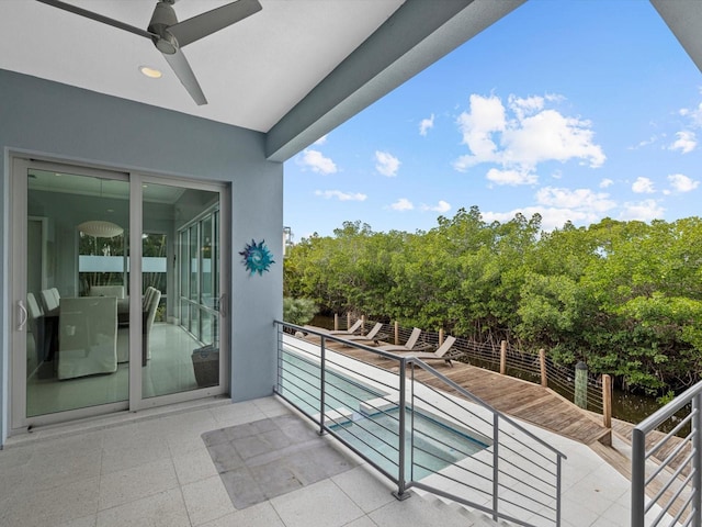 balcony with a ceiling fan