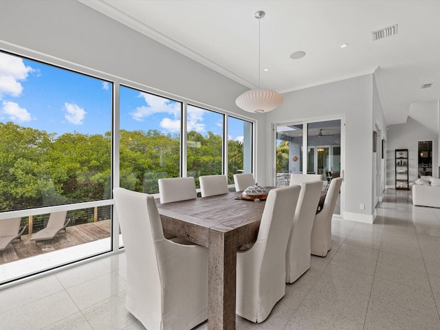 dining area featuring light speckled floor, recessed lighting, visible vents, ornamental molding, and baseboards