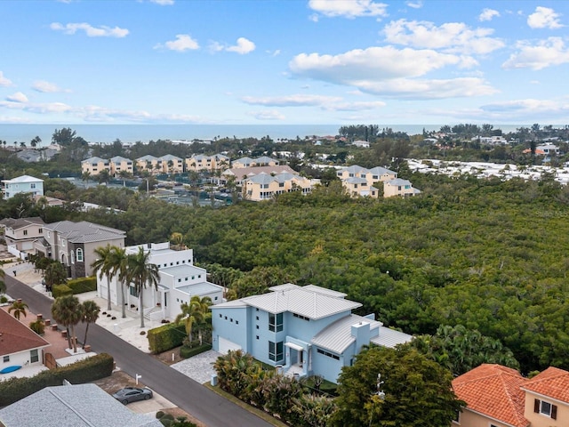 aerial view featuring a water view and a residential view