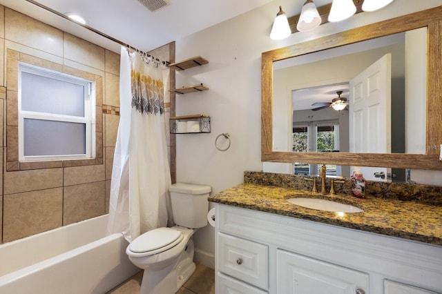 full bathroom featuring shower / bath combination with curtain, ceiling fan, toilet, vanity, and tile patterned flooring