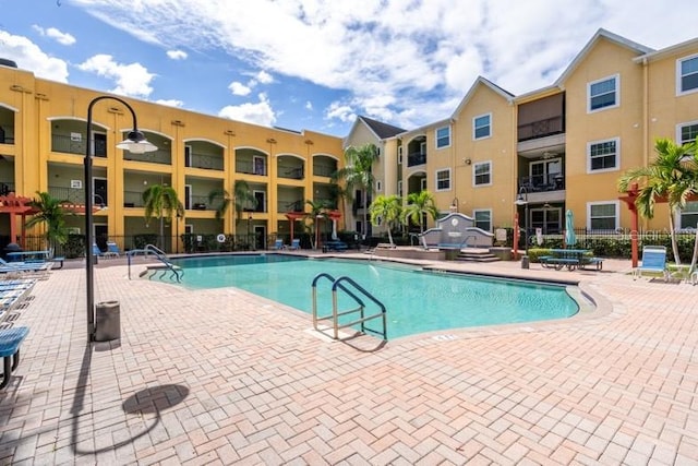 view of pool featuring a patio