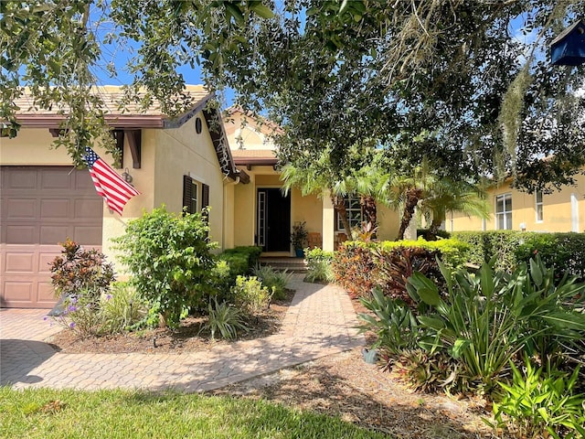 view of front of property featuring a garage