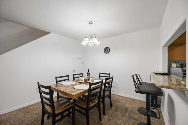 10959 Keys Gate Dr, Riverview, FL 33579 - carpeted dining area with baseboards and an inviting chandelier