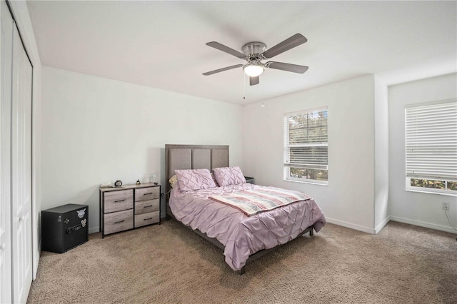 10959 Keys Gate Dr, Riverview, FL 33579 - bedroom featuring a ceiling fan, light colored carpet, and baseboards