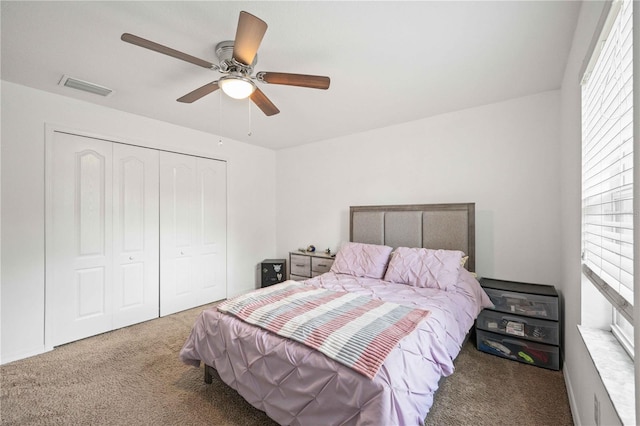 10959 Keys Gate Dr, Riverview, FL 33579 - bedroom with a closet, visible vents, multiple windows, and carpet flooring
