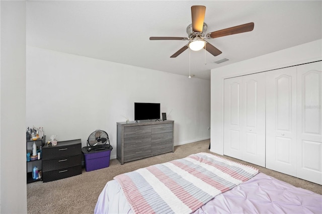 10959 Keys Gate Dr, Riverview, FL 33579 - carpeted bedroom with visible vents, a ceiling fan, and a closet