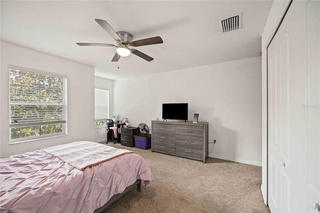 10959 Keys Gate Dr, Riverview, FL 33579 - bedroom with visible vents, ceiling fan, baseboards, and carpet floors