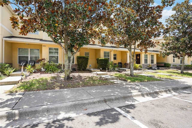10959 Keys Gate Dr, Riverview, FL 33579 - view of front of home featuring stucco siding