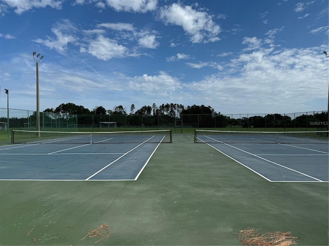 10959 Keys Gate Dr, Riverview, FL 33579 - view of tennis court with fence and community basketball court