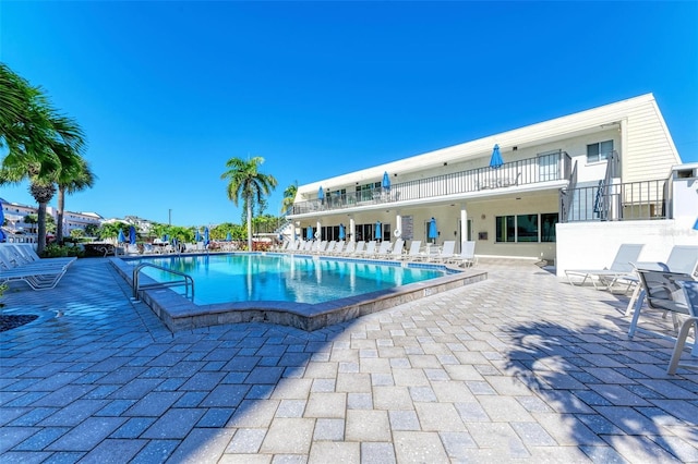 pool with a patio