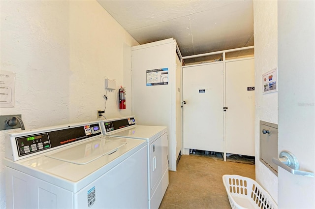 common laundry area featuring washer and dryer