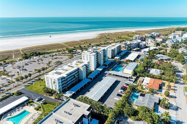 bird's eye view with a beach view and a water view