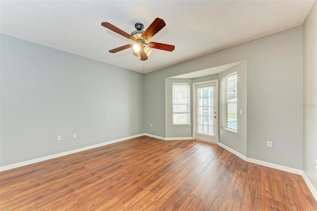 unfurnished room featuring wood-type flooring and ceiling fan